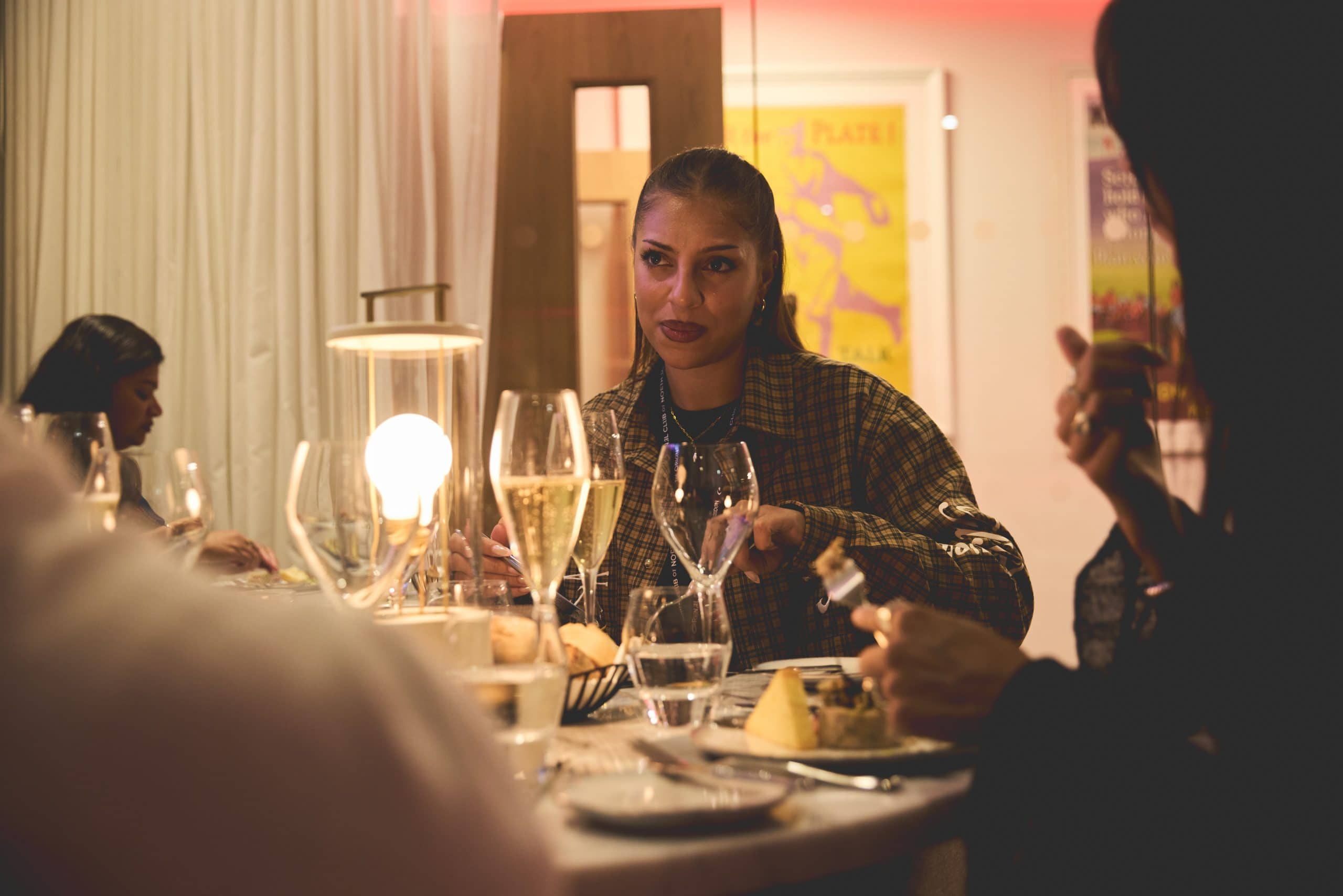 Woman eating in w club